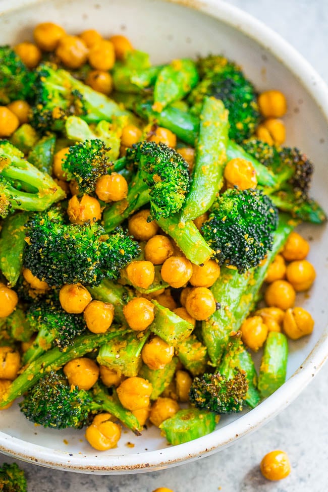 Cheesy Roasted Broccoli and Chickpeas — Fast, EASY, healthy, and keeps you full and satisfied!! Vegan and gluten-free doesn't have to be boring! Perfect lunch, hearty side, or meatless main! You're going to LOVE the cheesy touch!!