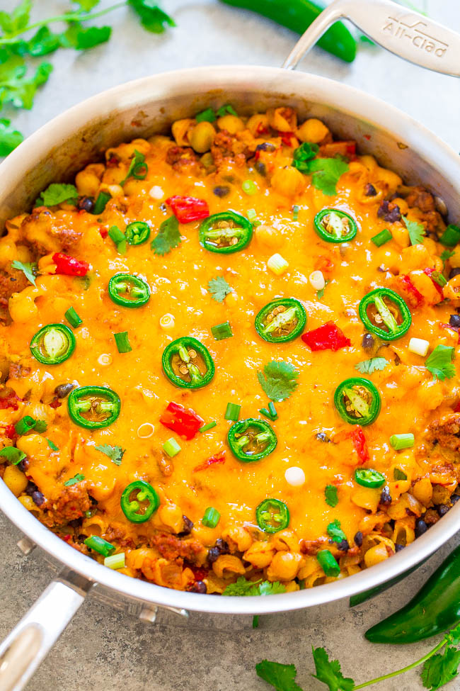 Easy 30-Minute Southwestern Beef Skillet - EASY, family friendly, ready in 30 minutes, and COMFORT FOOD at its best!! Ground beef, PASTA, black beans, tomatoes, taco seasoning, and CHEESE for a Southwestern flair!!
