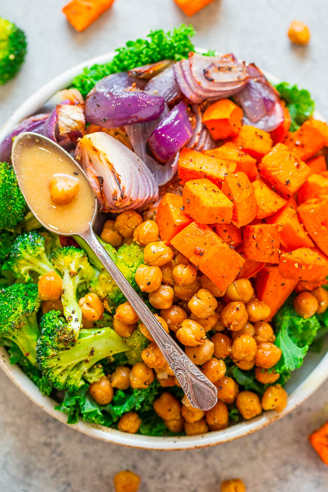 Roasted Sweet Potato and Chickpea Buddha Bowl - A big ole round bowl full of goodness just like Buddha!! The bowls are fast, EASY, naturally vegan and gluten-free! If you need a HEALTHY recipe that tastes like comfort food, this is it!!