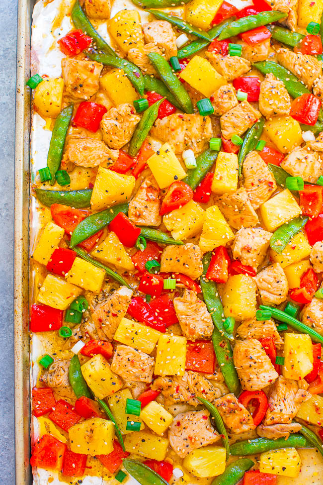 Sheet Pan Pineapple Teriyaki Chicken — Fast, EASY, and loaded with fabulous teriyaki flavor! Tender chicken, juicy pineapple, and crisp-tender veggies make make for a DELISH one-pan meal with zero cleanup.