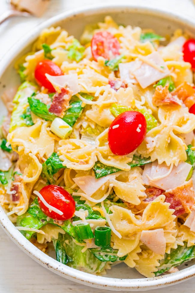 Club Sandwich Pasta Salad - All your favorite club sandwich ingredients in an EASY pasta salad!! Turkey, bacon, tomatoes, lettuce, and cheese with ranch! Ready in 15 minutes and perfect for potlucks, picnics, and parties!!
