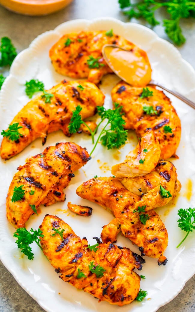 Spicy Garlic Grilled Chicken - An EASY homemade marinade made with everyday ingredients that produces super FLAVORFUL, juicy chicken!! If you're looking for a NEW marinade to jazz up grilled chicken, this is the one!!