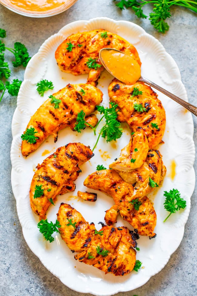 Grilled Spicy Garlic Chicken — An EASY homemade marinade made with everyday ingredients that produces super FLAVORFUL, juicy chicken!! If you're looking for a NEW marinade to jazz up grilled chicken, this is the one!!