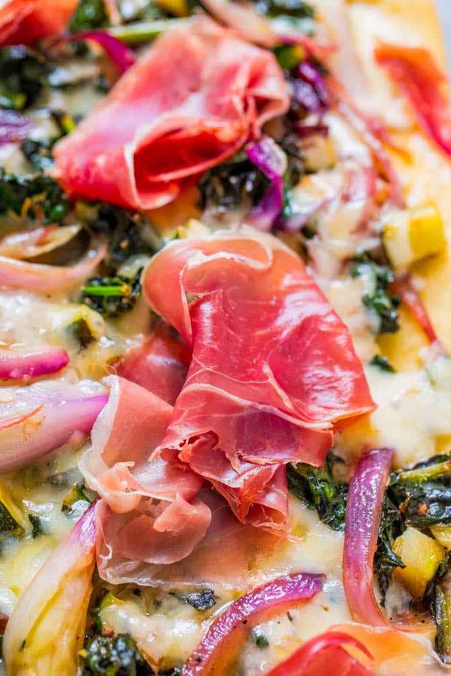Prosciutto Flatbread Pizza — Topped with prosciutto, red onion, kale, balsamic, and made with store-bought dough! Perfect for FAST dinners or EASY entertaining!!