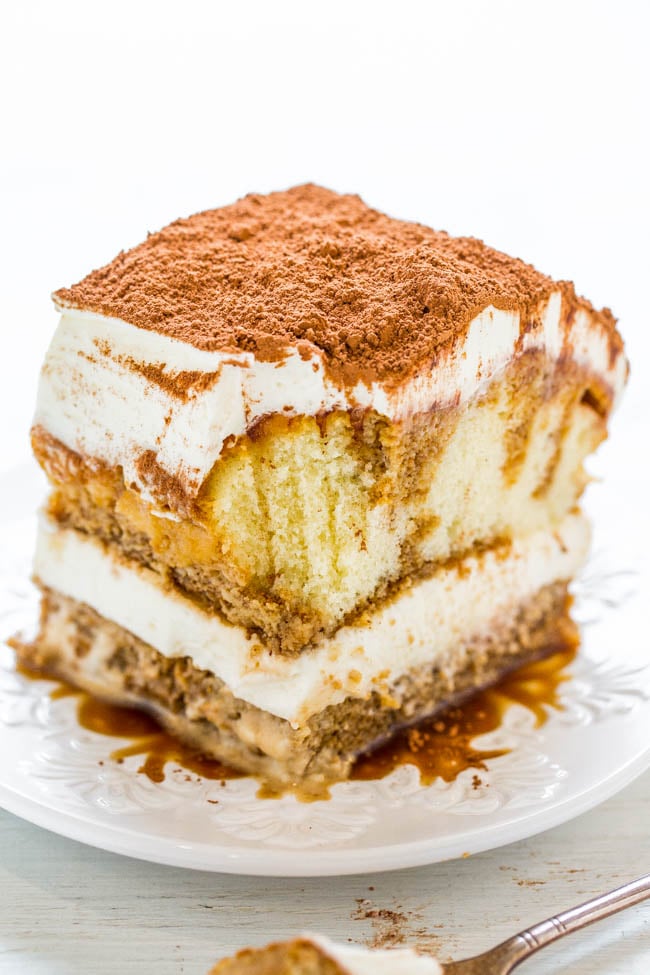 No-Bake Easy Tiramisu — FAST, no-bake, and infused with the richness of espresso, Kahlua, a luscious creamy filling, and dusted with cocoa powder!! Decadent and authentic but SO EASY!!