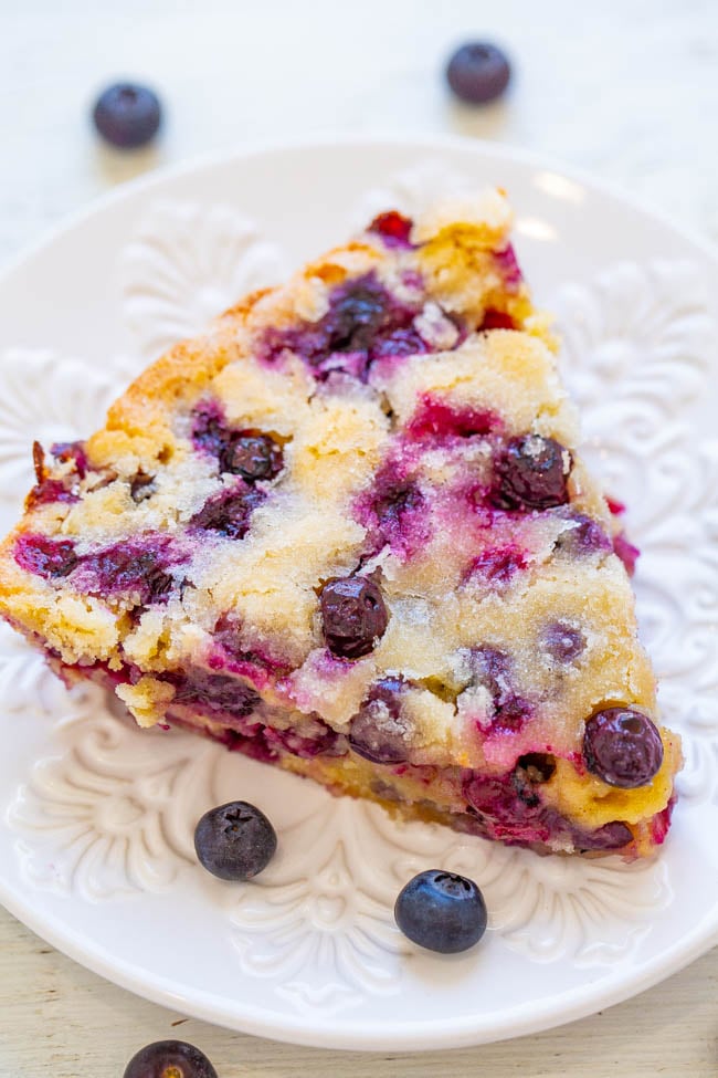 Crustless Blueberry Pie – a FAST, crustless, no-mixer dessert that’s perfect for summer entertaining, picnics, or potlucks!! Somewhere in between pie, cake, and blondies is what you get with this FABULOUS blueberry dessert recipe! Take advantage of those FRESH blueberries!!