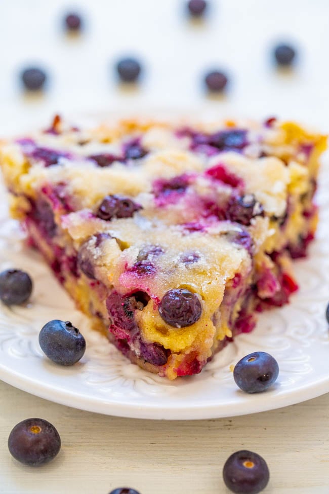 Crustless Blueberry Pie – a FAST, crustless, no-mixer dessert that’s perfect for summer entertaining, picnics, or potlucks!! Somewhere in between pie, cake, and blondies is what you get with this FABULOUS blueberry dessert recipe! Take advantage of those FRESH blueberries!!