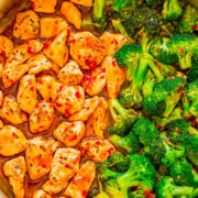 A bowl of chicken and broccoli stir-fry seasoned with spices.