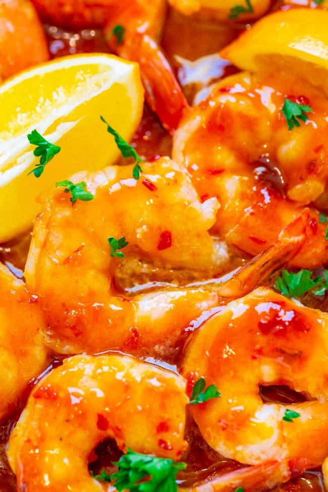10-Minute Orange Chili Shrimp - The sweet-and-tangy Asian-inspired orange chili sauce is PERFECT on these big juicy shrimp!! An EASY, healthy recipe that's sure to IMPRESS and ready in 10 minutes!!