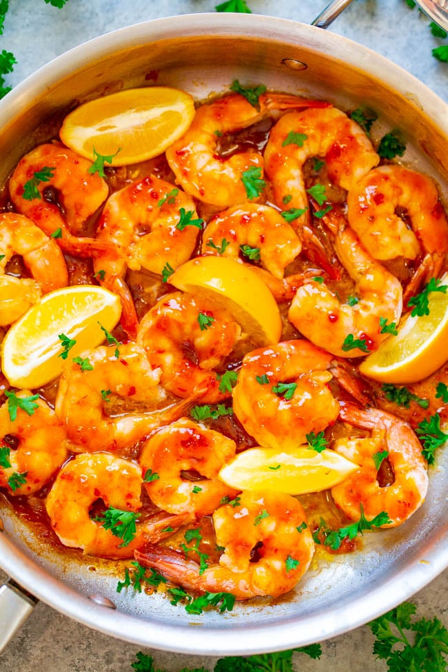 10-Minute Orange Chili Shrimp - The sweet-and-tangy Asian-inspired orange chili sauce is PERFECT on these big juicy shrimp!! An EASY, healthy recipe that's sure to IMPRESS and ready in 10 minutes!!