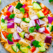 Colorful chicken and vegetable flatbread pizza.
