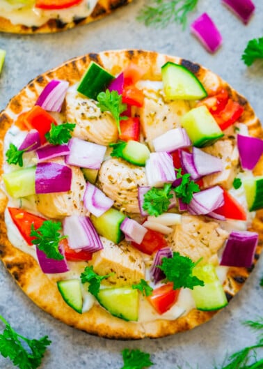 Colorful chicken and vegetable flatbread pizza.