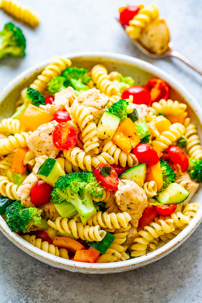 overhead view of italian chicken pasta salad in a large white bowl