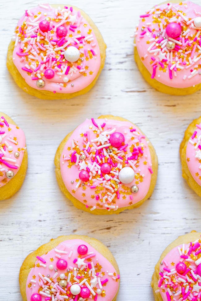 Frosted Soft Sugar Cookies topped with pink and white sprinkles