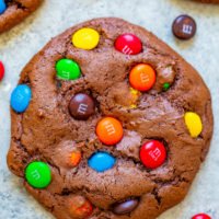 Colorful candy-coated chocolates embedded in a freshly baked chocolate cookie.