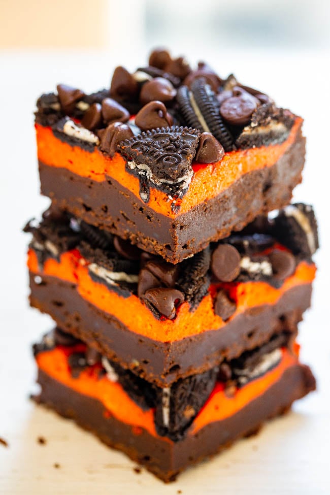 halloween cream cheese brownies in a stack of three