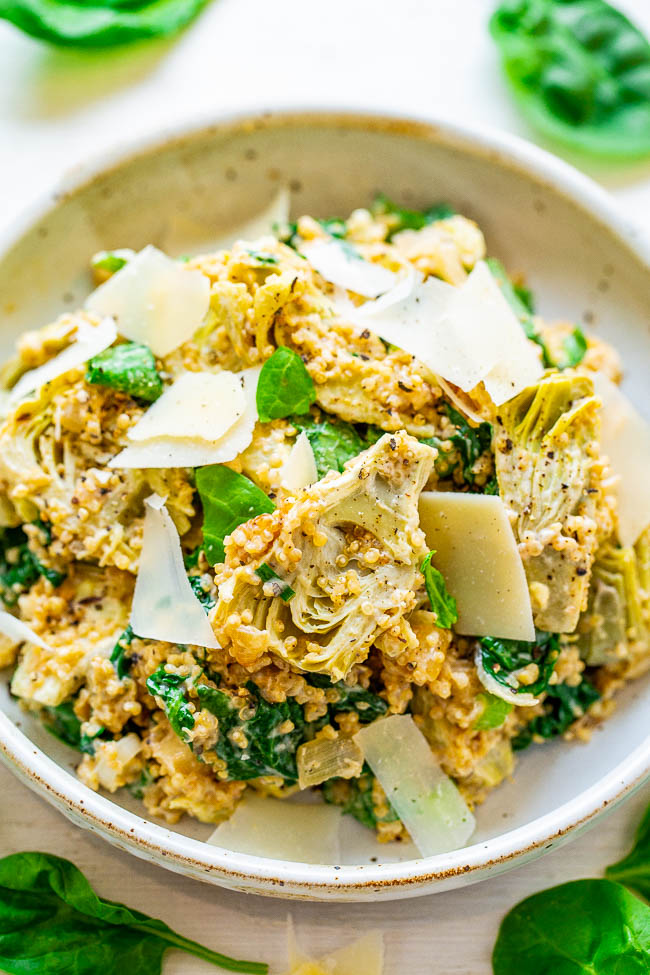Spinach And Artichoke Quinoa Salad - All the flavors of classic spinach and artichoke dip are in this HEALTHY salad!! The only thing that's missing is tons of fat and calories! FAST, EASY, naturally gluten-free, vegetarian, and tastes DELISH!!