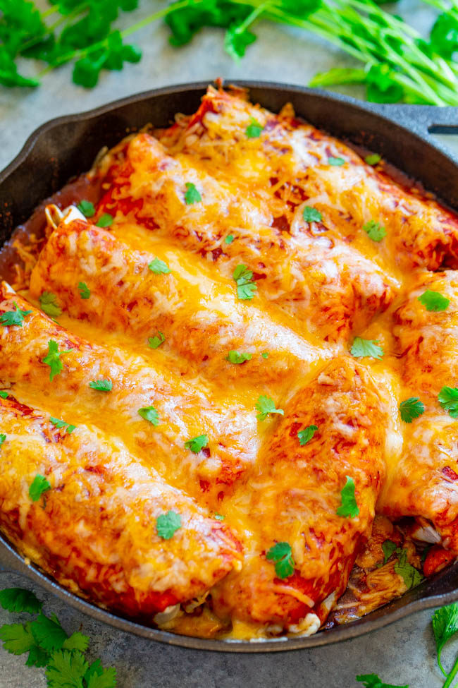 Loaded Smothered Beef Burritos with cheese and greens