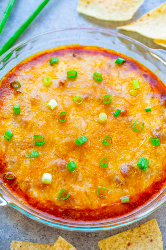 5-Minute Chili Cheese Dip - EASY, ready in 5 minutes, just 3 main ingredients, and made in the microwave!! The CHEESE is irresistible! The perfect game day or easy party appetizer that everyone LOVES!!
