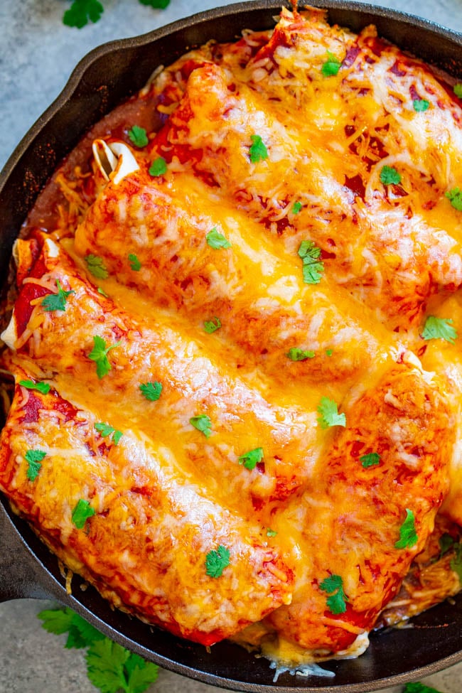 Smothered Beef Burritos in cast iron skillet