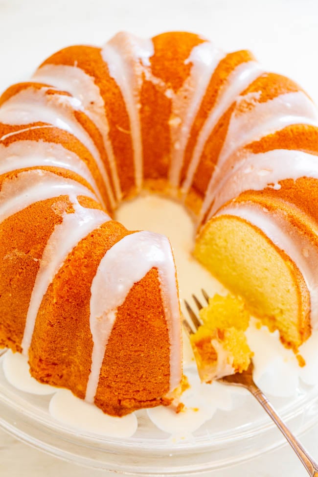 Easy Glazed Pound Cake - Finally a pound cake that isn't dry!! This EASY, buttery, velvety pound cake will be the star of your next party or celebration! If you're looking for that PERFECT pound cake recipe, this is the one!!
