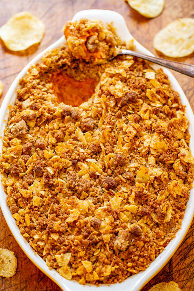 Sweet and Savory Sweet Potato Casserole — A fun and EASY twist on classic sweet potato casserole that uses potato chips in the topping for a SALTY-SWEET flavor the whole family will love!! Great for Thanksgiving and Christmas celebrations!!