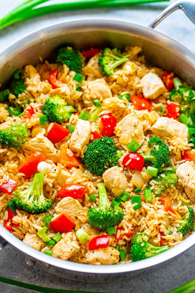 Chicken and Rice Skillet with Veggies - EASY, ready in 20 minutes, made in ONE skillet with everyday ingredients you probably have on hand!! A HEALTHY weeknight dinner the whole family will LOVE!!