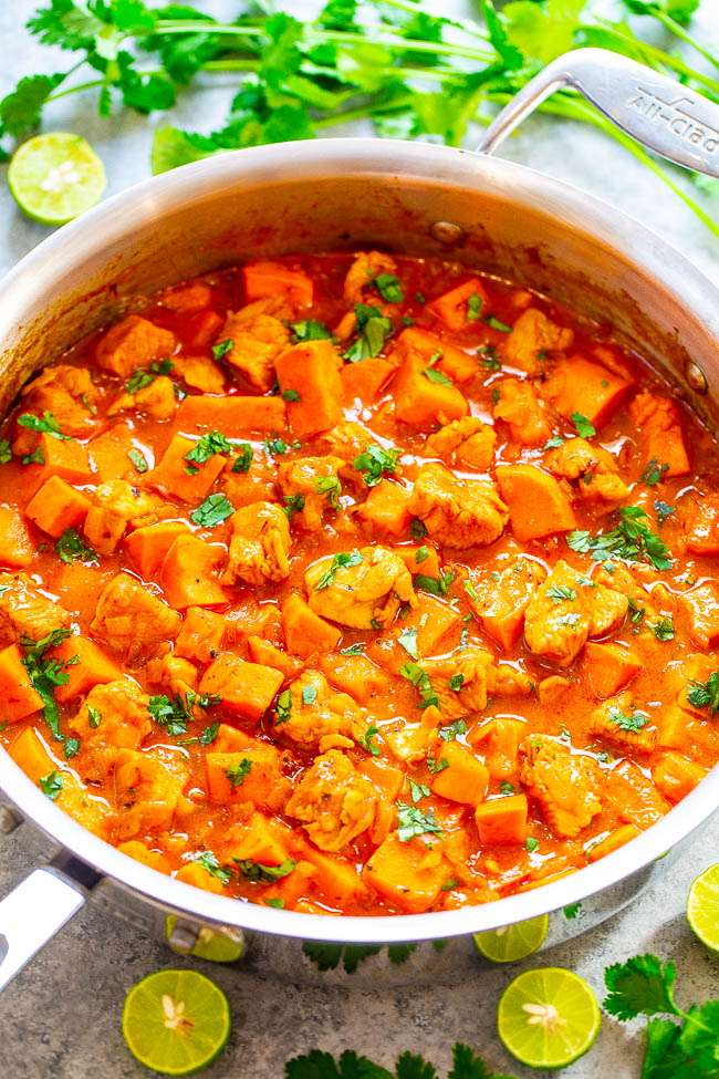 Coconut Lime Chicken and Sweet Potato Curry - An EASY, one-skillet curry that’s ready in 20 minutes and tastes BETTER than a restaurant!! Juicy chicken and tender sweet potatoes simmer in a lime-scented coconut milk sauce that tastes AMAZING! Healthy comfort food!!