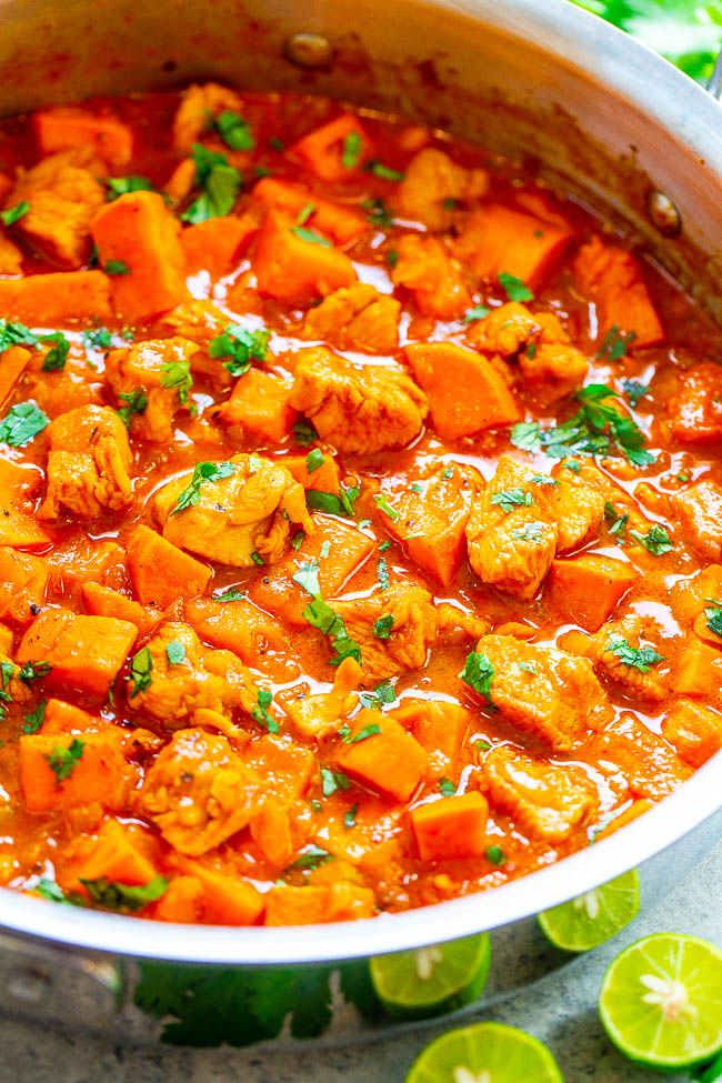 Coconut Lime Chicken and Sweet Potato Curry - An EASY, one-skillet curry that’s ready in 20 minutes and tastes BETTER than a restaurant!! Juicy chicken and tender sweet potatoes simmer in a lime-scented coconut milk sauce that tastes AMAZING! Healthy comfort food!!