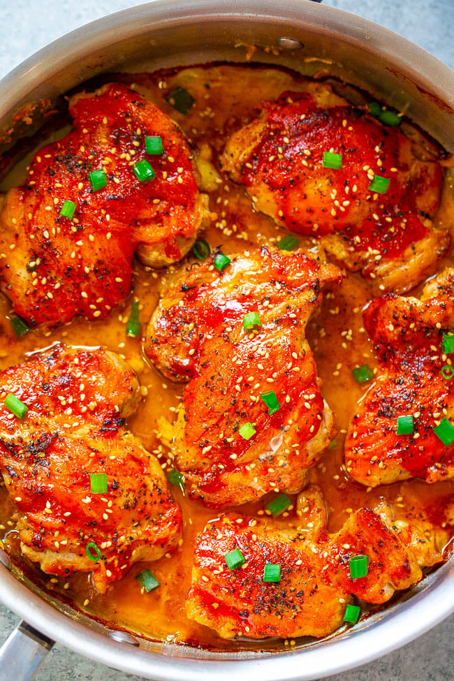 Easy Spicy-And-Sweet Glazed Chicken - Perfectly spicy with just the right amount of sweetness in this EASY, super flavorful recipe that leave you wanting more!! Crispy skin on the outside, juicy and tender inside, and so GOOD!!