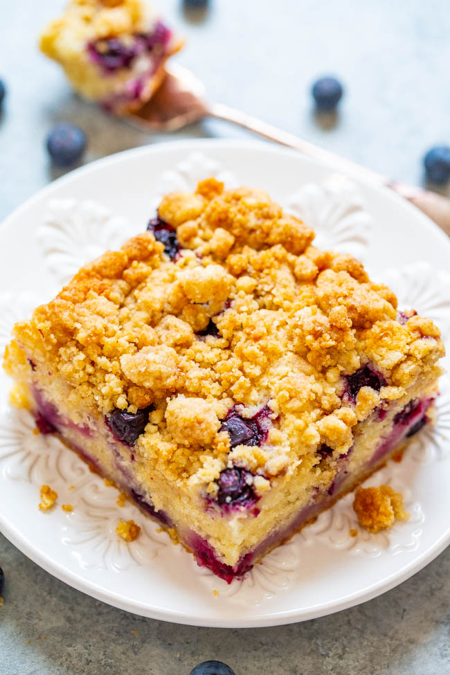 Blueberry Streusel Coffee Cake - An EASY, no-mixer cake studded with juicy blueberries and topped with big buttery streusel nuggets that are just SO GOOD!! Not overly sweet and PERFECT with a cup of coffee for breakfast, brunch, or a snack!!