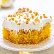 Butterscotch Toffee Poke Cake - Butterscotch sundae topping isn't just for ice cream - it makes AWESOME poke cakes!! Along with the irresistibly crunchy toffee bits, this is a perfect fast and EASY cake everyone will love!! 