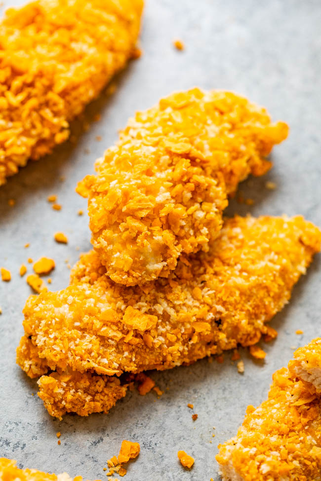 Cheez-It Chicken Tenders — EASY, ready in 15 minutes, and so CRISPY on the outside thanks to a Cheez-It Cracker coating!! Don’t bother frying chicken when you can bake it! If you like Cheez-Its, you're going to LOVE this chicken!!