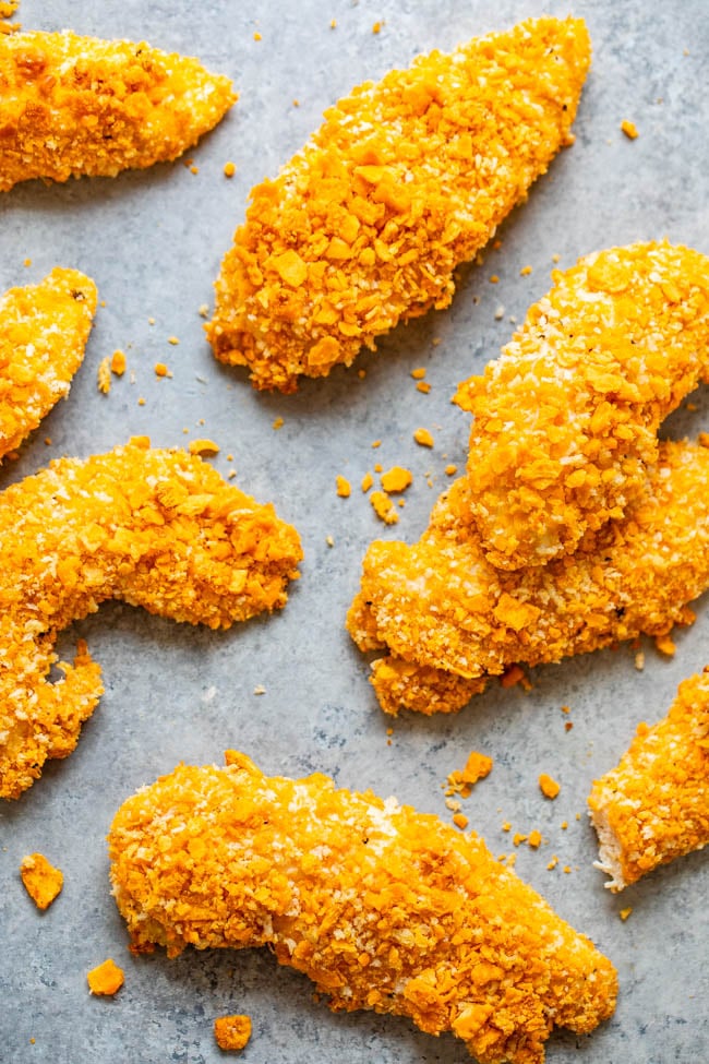 Cheez-It Chicken Tenders — EASY, ready in 15 minutes, and so CRISPY on the outside thanks to a Cheez-It Cracker coating!! Don’t bother frying chicken when you can bake it! If you like Cheez-Its, you're going to LOVE this chicken!!