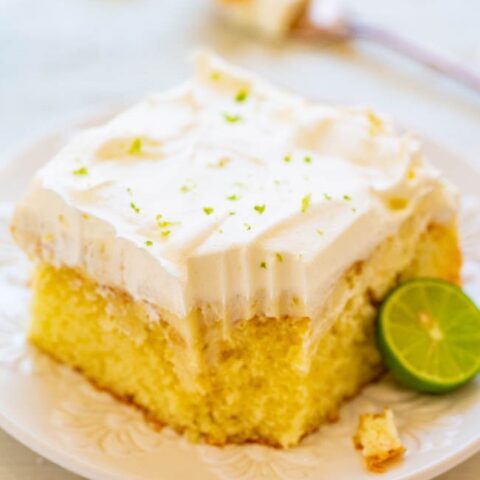 Key Lime Poke Cake - An EASY and refreshing cake with plenty of zippy lime flavor that's perfect for summer parties, picnics, and potlucks!! Everyone loves this tangy-and-sweet, light, and airy cake!!