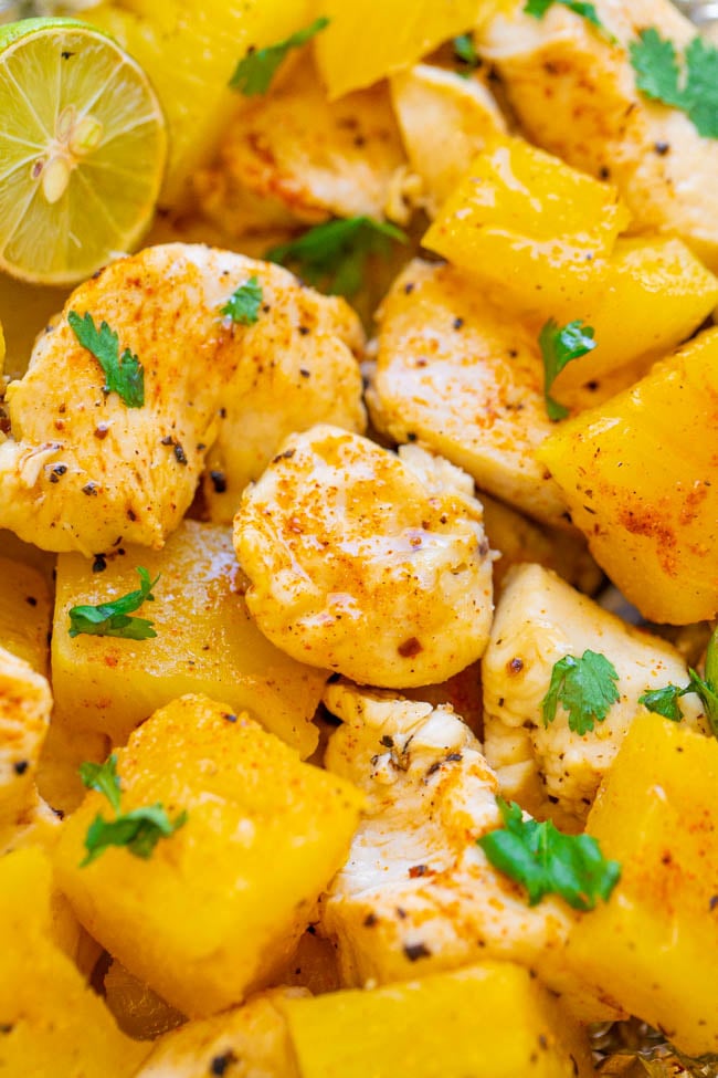 close up of cajun chicken and pineapple chunks