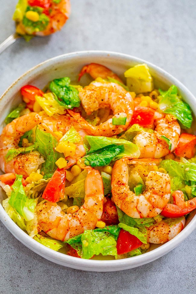 Honey Lemon Shrimp and Corn Salad - Tender juicy shrimp nestled in a crunchy fresh salad and everything is coated in an IRRESISTIBLE honey lemon sauce!! An EASY and HEALTHY salad that's ready in 10 minutes!!