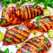 A plate of five grilled lime Sriracha chicken.