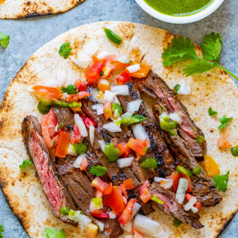 Carne Asada Tacos - EASY carne asada at home that rivals your favorite restaurant!! Tender juicy beef that's seasoned to perfection and topped with pico de gallo and salsa make these carne asada tacos INCREDIBLE!!