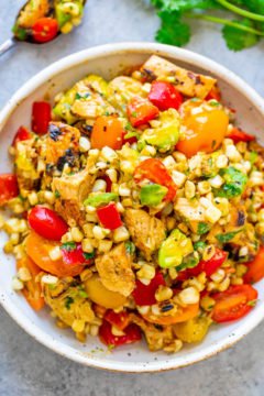 Grilled Chicken and Corn Salad -  An EASY salad that’s ready in 15 minutes and you won’t be able to stop eating it!! Tender chicken, juicy corn, crisp bell peppers and tomatoes, creamy avocado, cilantro, and fresh lime juice for the WIN!!