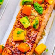 Chile Lime Salmon with Mango Avocado Salsa -  Tender and INCREDIBLE salmon with mango salsa that's bursting with Mexican FLAVORS to complement the fish!! So EASY and ready in 15 minutes!!