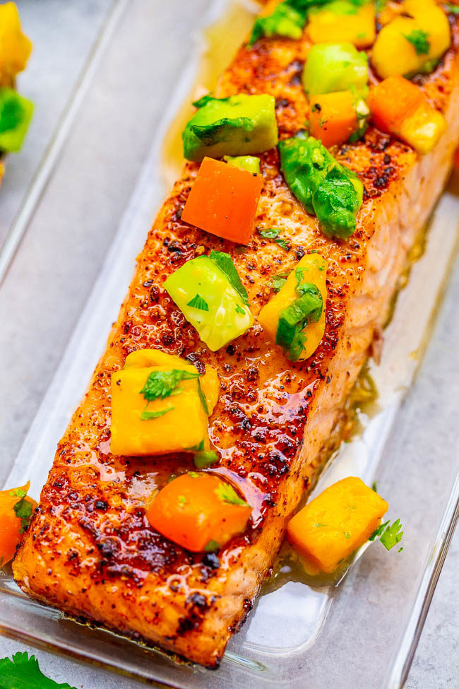 Chile Lime Salmon with Mango Avocado Salsa -  Tender and INCREDIBLE salmon with mango salsa that's bursting with Mexican FLAVORS to complement the fish!! So EASY and ready in 15 minutes!!
