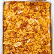 Piña Colada Chex Mix - An EASY and addictively AMAZING salty-sweet snack!! It's crunchy, chewy, and between the pineapple, coconut, banana, and lime you'll feel like you're on a tropical vacation!!