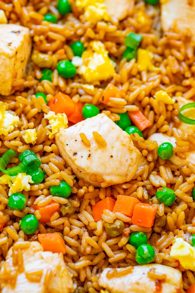 15-Minute Sheet Pan Fried Rice (with Chicken) — Easy HEALTHIER "fried rice" that's actually baked and not fried!! Full of authentic flavor and ready faster than you can call for takeout!! Perfect for busy weeknights and a family FAVORITE!!