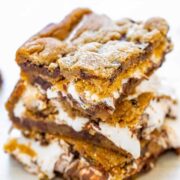 Chocolate Chip Cookie Smores Bars - Between layers of super soft chocolate chip cookie dough there's chocolate, marshmallows, and graham cracker crumbs for the most DECADENT smores ever!! So EASY and just 4 main ingredients!! 