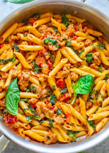 One Pot Italian Sausage and Tomato Basil Pasta - An EASY comfort food recipe that's loaded with Italian flavors, ready in 20 minutes, made in ONE pot, and a family favorite!! No need to boil the pasta separately to save time and dishes!!