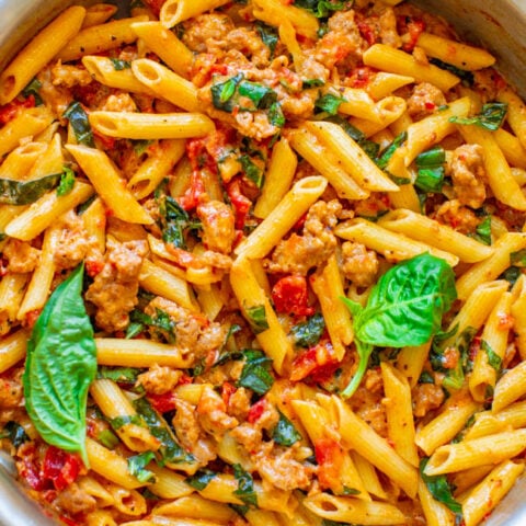 One Pot Italian Sausage and Tomato Basil Pasta - An EASY comfort food recipe that's loaded with Italian flavors, ready in 20 minutes, made in ONE pot, and a family favorite!! No need to boil the pasta separately to save time and dishes!!