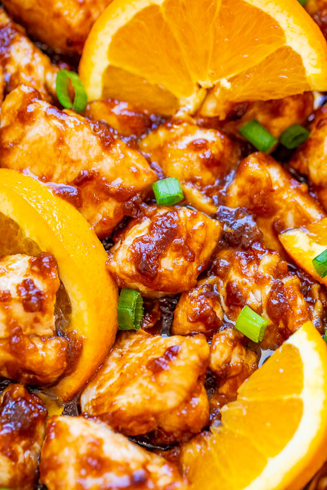 Healthier Orange Chicken - Stop calling for takeout or going to the mall food court and make this HEALTHIER orange chicken at home in less than 10 minutes!! EASY, authentic, and so INCREDIBLE that you'll never miss the fat and calories!!