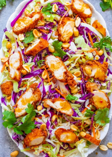 Crunchy Peanut Chicken Salad - Crispy fried chicken with crunchy cabbage, carrots, peanuts, cilantro and the EASIEST and BEST homemade peanut sauce that coats every bite!! A salad that you'll CRAVE over and over!! 