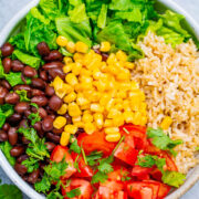 Black Bean Burrito Bowl Salad - Your favorite burrito ingredients minus the meat and extra carbs to keep things HEALTHIER!! Ready in 10 minutes and keeps you satisfied but not stuffed! Great EASY lunch, dinner, or meal prep recipe!!